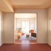walkway with living room seating and windows