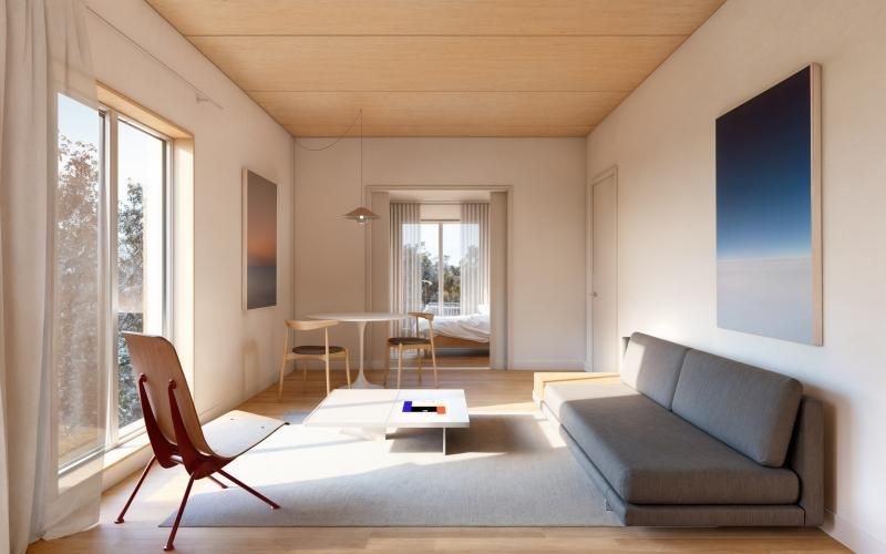 a living room with a couch and a table